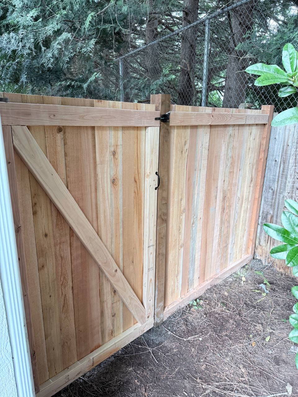Cedar privacy fence with double gate