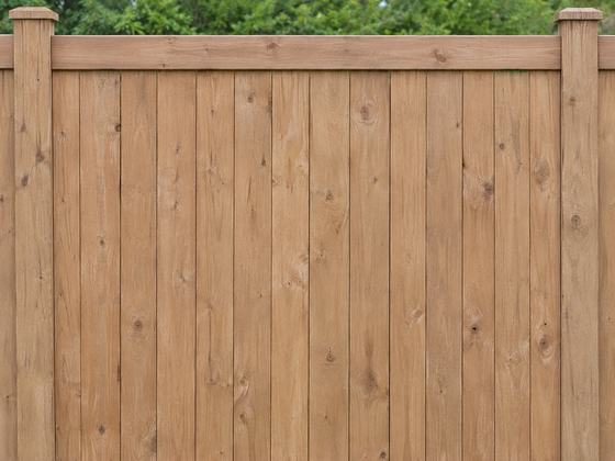 Premier cedar fence with framed rails and post caps